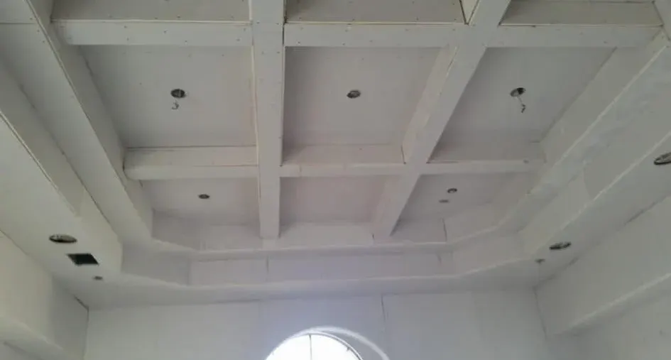 Finished coffered drywall ceiling with recessed lights